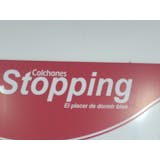 Logotipo de Colchones Stopping