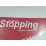 Logotipo de Colchones Stopping
